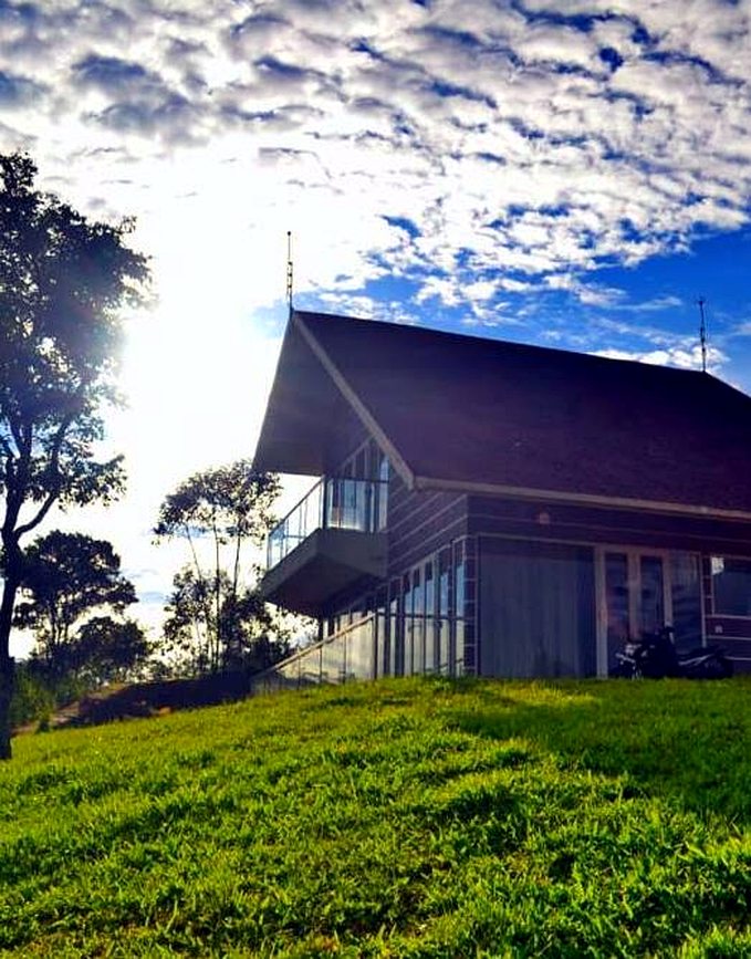 Cuckoos Nest villa on the hillside at golden hour